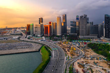 Singapore city skyline at sunset.