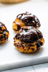 French Dessert Chocolate Eclair with Cream Filled Close Up Macro View