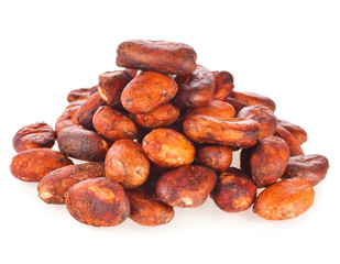 Heap of cacao beans isolated on a white background.
