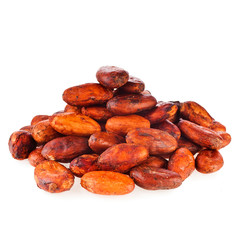 Heap of cacao beans isolated on a white background.