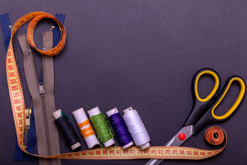 Copyspace frame with sewing tools and accesories. Tools for sewing and handmade: thread, scissors,...