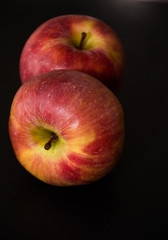 apples on black background