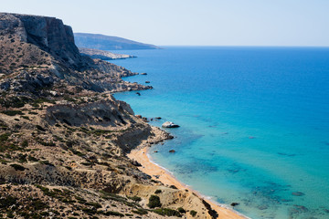 Fototapeta na wymiar The red beach (red sand) at Matala, Crete, Greece.