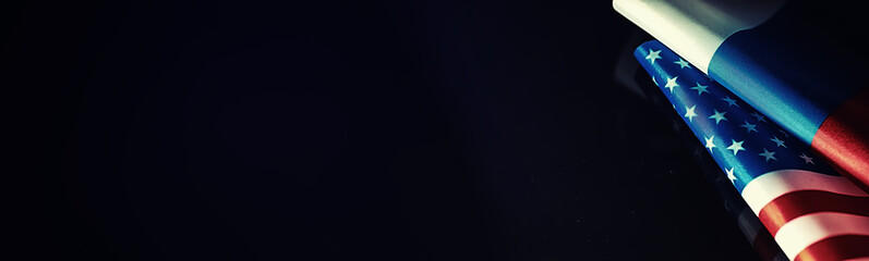 The concept of diplomatic relations. Flag of the United States of America and the Russian...