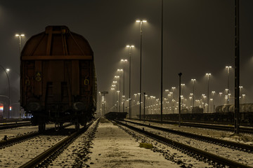 Fototapeta na wymiar Train Against Sky At Night During Winter