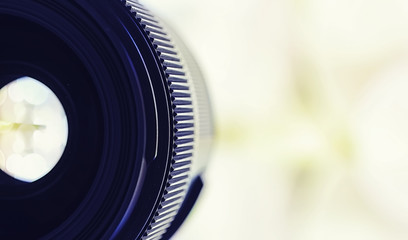 Equipment videographer and photographer. Lenses on the table against the background of bright...