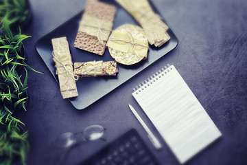 Tilt shift effect.Concept of losing weight and a healthy lifestyle. Bread roll with vegetables and...