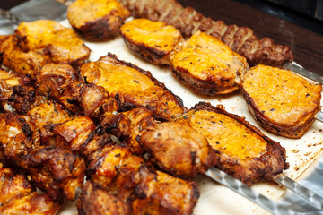 Spiced meat with herbs and onions, fried in tandoor. Shish kebab. Barbecue.