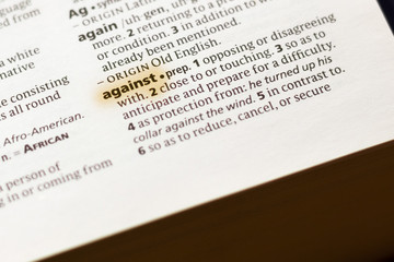 The word or phrase Against in a dictionary.