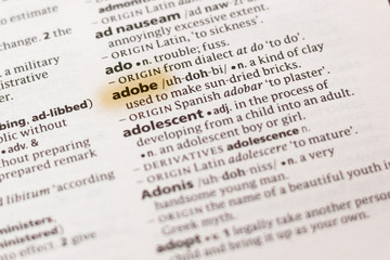 Ivanovsk, Russia - November 19, 2018: The word or phrase Adobe in a dictionary.