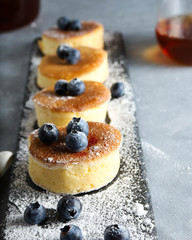 cake with blueberries and cream