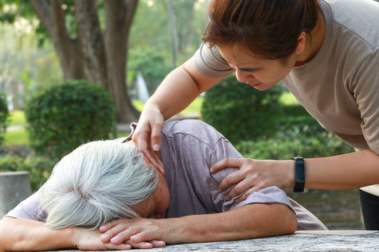 Sick Asian Senior Woman Fainted Unconscious At The Table, Fall Face Down,elderly Female Patient Stop Breathing Due To Heart Failure, Cardiac Arrest,severe Arrhythmia, Sudden Unexpected Death Syndrome.