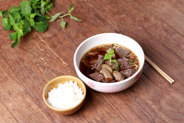  Close up shot of Thailand traditional ekaehla beef soup.( KaoLau) with Rice, food thai style.