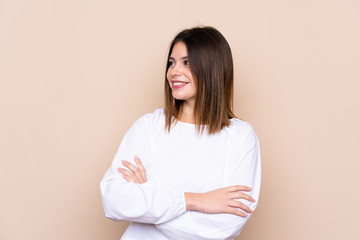 Young woman over isolated background laughing