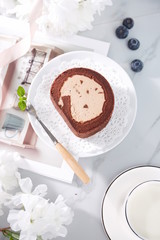 Homemade chocolate mousse cake on a white plate