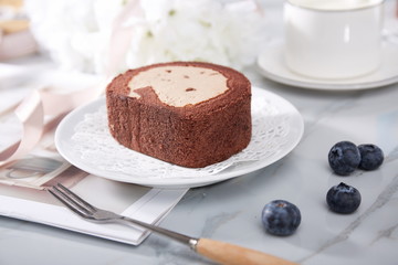 Homemade chocolate mousse cake on a white plate