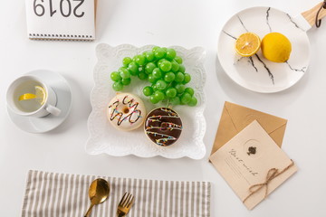 Sweet cake collection, which includes dishes, knives and forks for parties, birthdays and weddings. All kinds of delicious and beautiful desserts, macarons