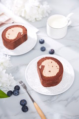 Homemade chocolate mousse cake on a white plate