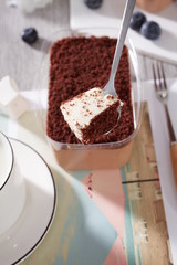 Homemade chocolate mousse cake on a white plate