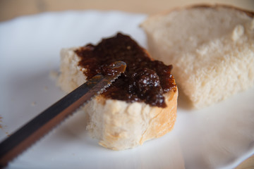 Homemade jam spread on a slice of bread