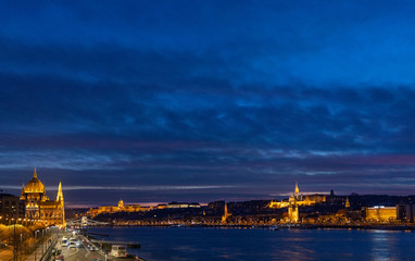 Budapest during the night, Hungarian parliament (left), Buda castle (center) and Matthias church...