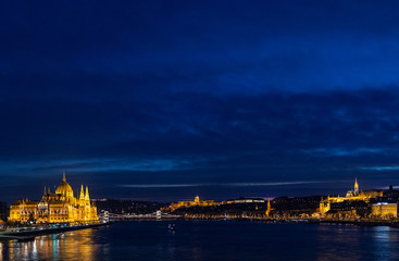 Budapest during the night, Hungarian parliament (left), Buda castle (center) and Matthias church...