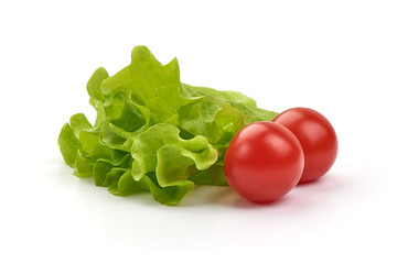 Lettuce salad leaf and cherry tomatoes, isolated on white background