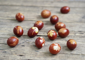 Easter eggs painted onion peel on a wooden ancient background. We use all natural.