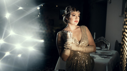 woman in the image of 20s, looks like a frame from old films, on the head of the diodema a...