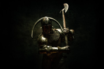 Portrait of a Viking Berserker warrior, holding a halberd in his hands