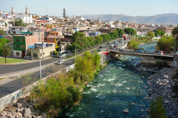 Arequipa/Peru: cityscape and Chili river, topview.