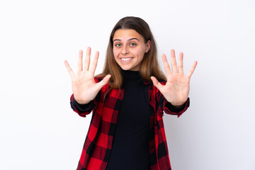 Teenager girl over isolated white background counting ten with fingers