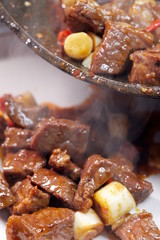 The method of making folk barbecue in Asia