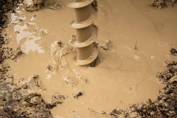 The process of drilling a water well with a winding drill