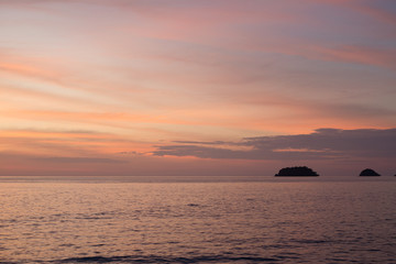 Naklejka na ściany i meble Sea pink sunset. Beautiful color clouds.