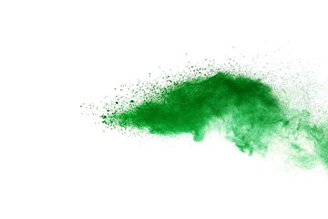 Green powder explosion on white background.
