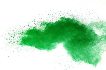 Green powder explosion on white background.