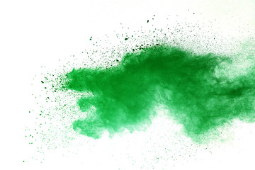 Green powder explosion on white background.