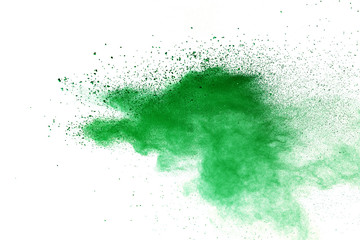 Green powder explosion on white background.