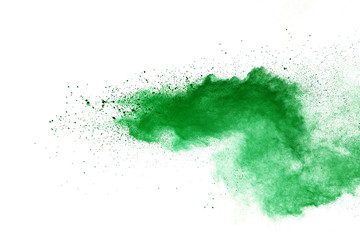 Green powder explosion on white background.