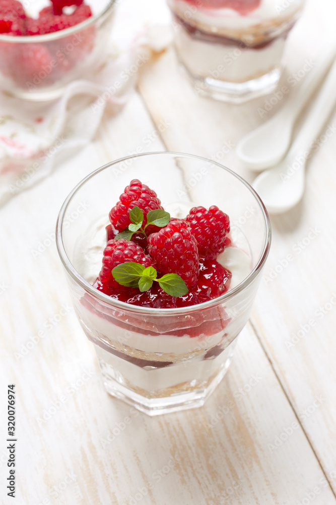 Canvas Prints cheesecake with raspberries in glasses