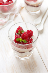 cheesecake with raspberries in glasses