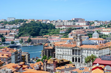 Naklejka premium Old buildings in Porto city Portugal. Red roofs of historic area