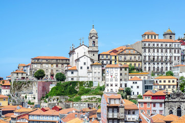 Fototapeta na wymiar Old buildings in Porto city Portugal. Red roofs of historic area