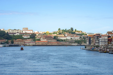 Fototapeta na wymiar Douro river embankment, Ribeira district, Porto city, Portugal