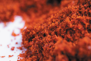 Red paprica powder macro background image