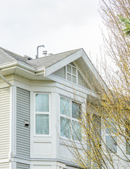 The top of the house with nice window.