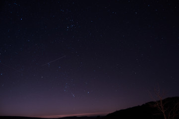Naklejka premium Photo des étoiles dans le ciel. cette photo à été réalisée dans mon jardin le soir.