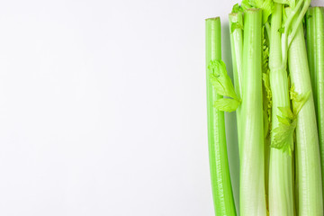 Obraz premium Green celery on white background