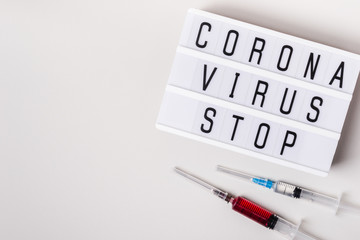 Lightboard with words Coronavirus stop. Atypical pneumonia in Wuhan, China. Severe acute...